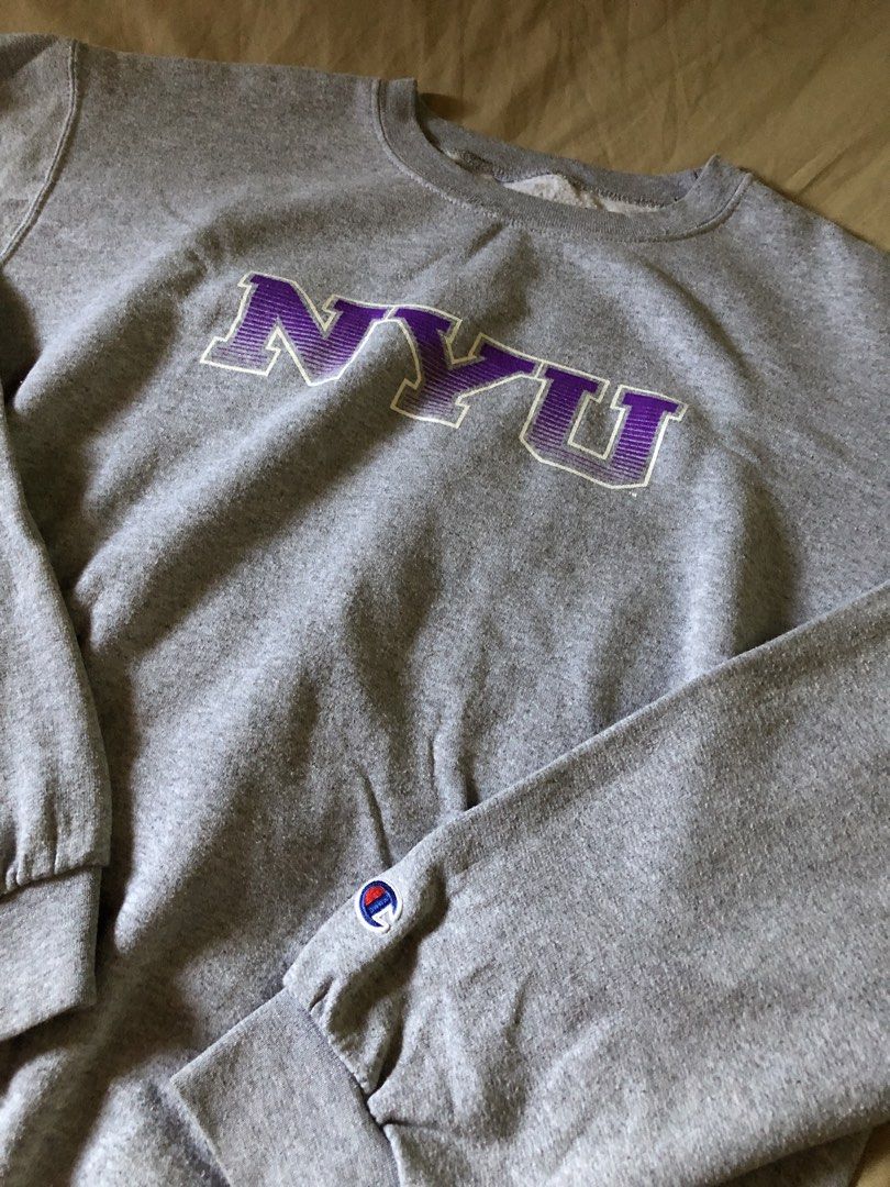 Champion NYU sweater (Category: Coats, Jackets and Outerwear) located in Muntinlupa City. Submitted by josh_fitsnfinds (Listing ID 1466407132, Image 2). Description: good condition..