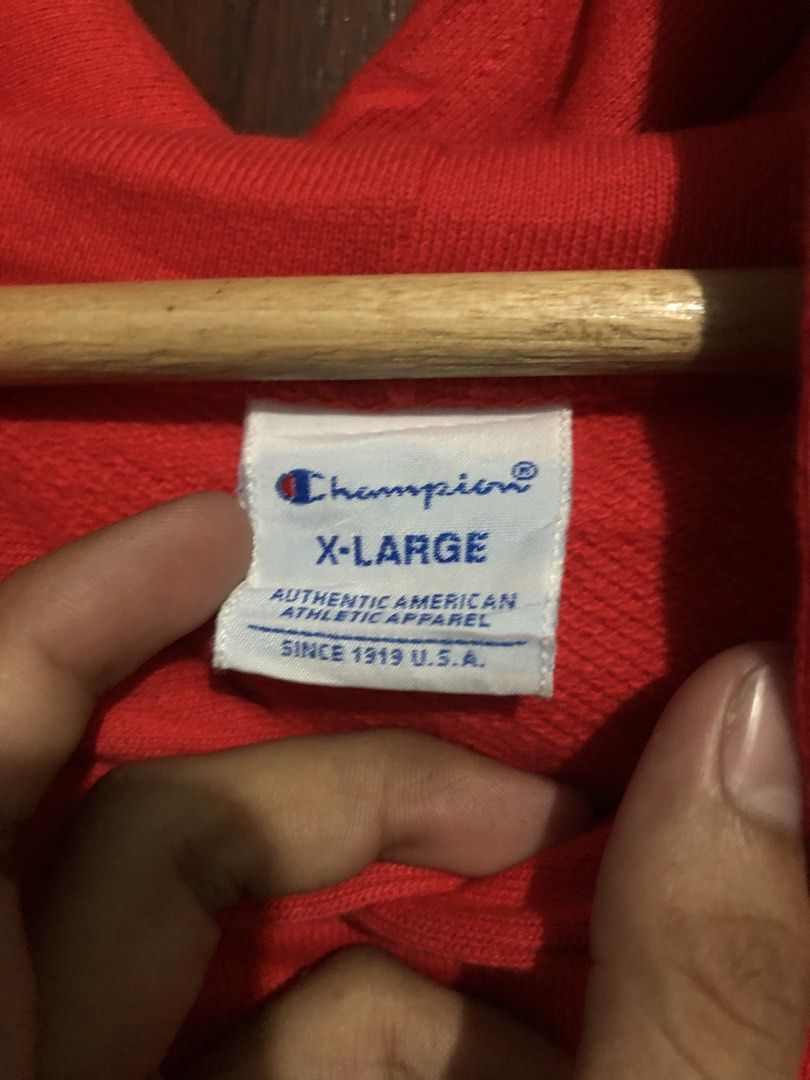 Champion Red Hoodie X-Large (Category: Hoodies) located in Quezon City. Submitted by yeahsource222 (Listing ID 1466410451, Image 3). Description: - Brand: Champion - Color: Bright Red - Size: XL - Material: 100% Cotton - Details: Classic embroidered C logo on chest and left cuff, adjustable hood drawstrings, front pouch pocket - Style: Comfortable fit, perfect for everyday streetwear - Condition: 100% authentic and well-maintained - Shipping: Fas