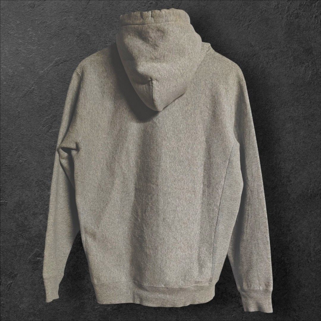 Champion Reverse Weave (Category: Coats, Jackets and Outerwear) located in Rizal. Submitted by itsmecle0 (Listing ID 1466405182, Image 2). Description: • Fabric & Design: Made with heavy-duty cotton fleece using Champion's signature Reverse Weave technology, which prevents vertical shrinkage by cutting the fabric on the cross-grain. • Details: Features ribbed side panels for increased mobility, a front kangaroo pouch pocket, drawstring hood, and 