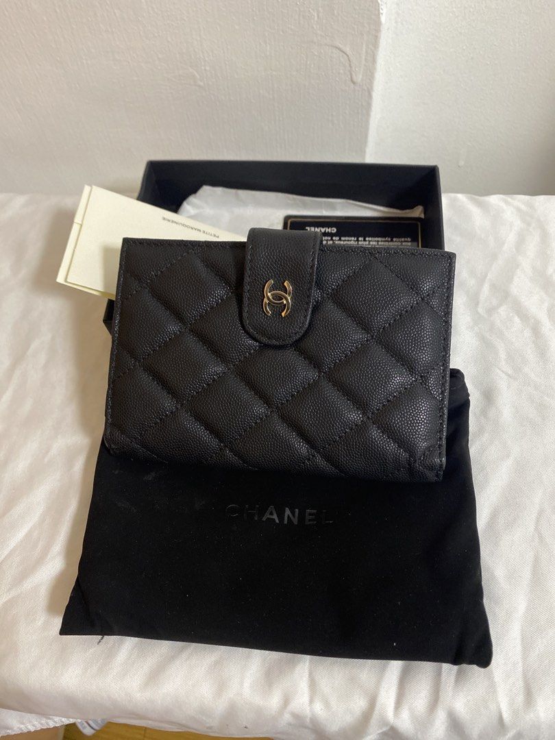 Chanel Quilted Caviar Small Flap Wallet Black (Category: Luxury Bags & Wallets) located in Pasig City. Submitted by raine.lb (Listing ID 1466423551, Image 1). Description: Authentic black caviar leather Chanel wallet with gold hardware and iconic CC logo. Comes complete with dust bag, box, and authenticity card. Compact size, perfect for mini bags. DM to order!.