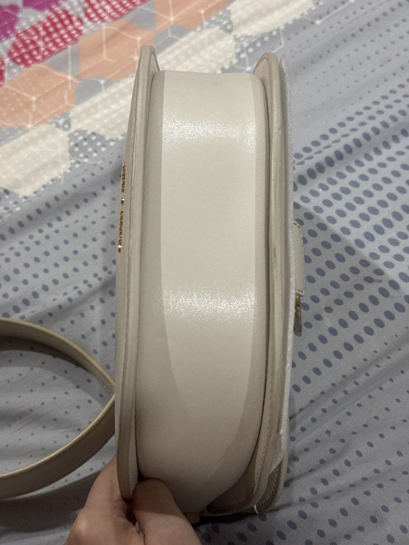 Charles & Keith Cream Saddle Bag (Category: Cross-body Bags) located in Manila. Submitted by cjy041 (Listing ID 1466515923, Image 3). Description: - Actual Photos Posted - Color: Cream - Size: M - Strap: shoulder and cross body strap included - dust bag included - price negotiable. -location: Sta. Cruz, Manila.