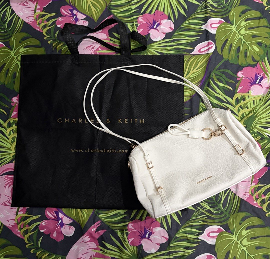 Charles & Keith Medium Levy (White) (Category: Shoulder Bags) located in Rizal. Submitted by prelovedbykristel (Listing ID 1463928907, Image 1). Description: with dustbag! :) i prefer black - MOP : BDO / Gcash - MOD : Lalamove ❌ no refund! :) .