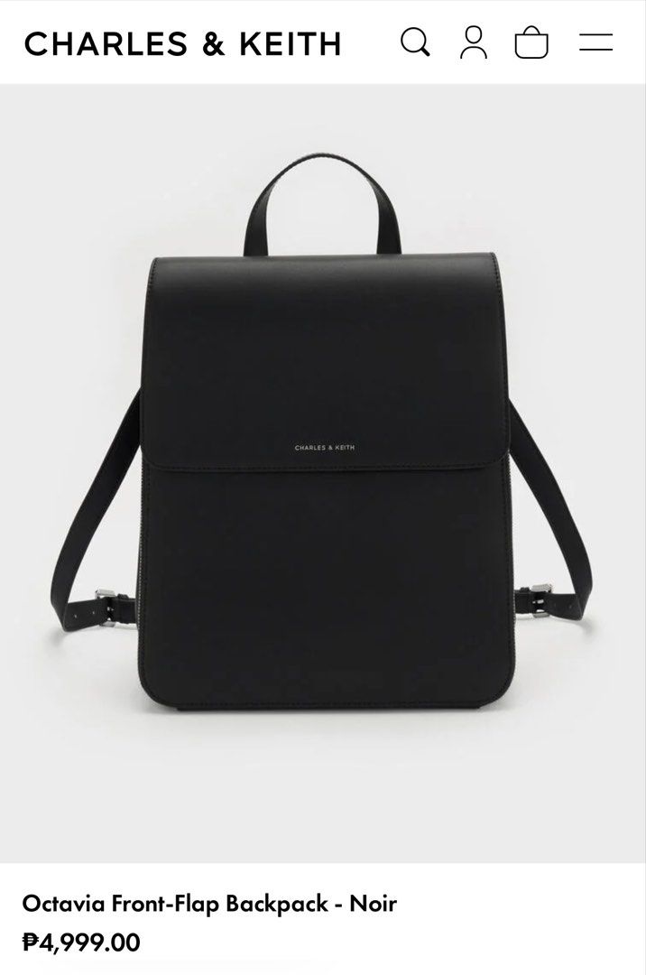 Charles & Keith Octavia Front-Flap Backpack - Noir (Category: Backpacks) located in Quezon City. Submitted by macydael (Listing ID 1466465450, Image 1). Description: Shipping from Katipunan, QC - Brand: Charles & Keith - Model: Octavia Front-Flap Backpack - Color: Black - Material: Calf PU with silver-tone hardware - Closure: Magnetic closure with top handle - Straps: Two detachable and adjustable shoulder straps included - Pockets: Convenient si