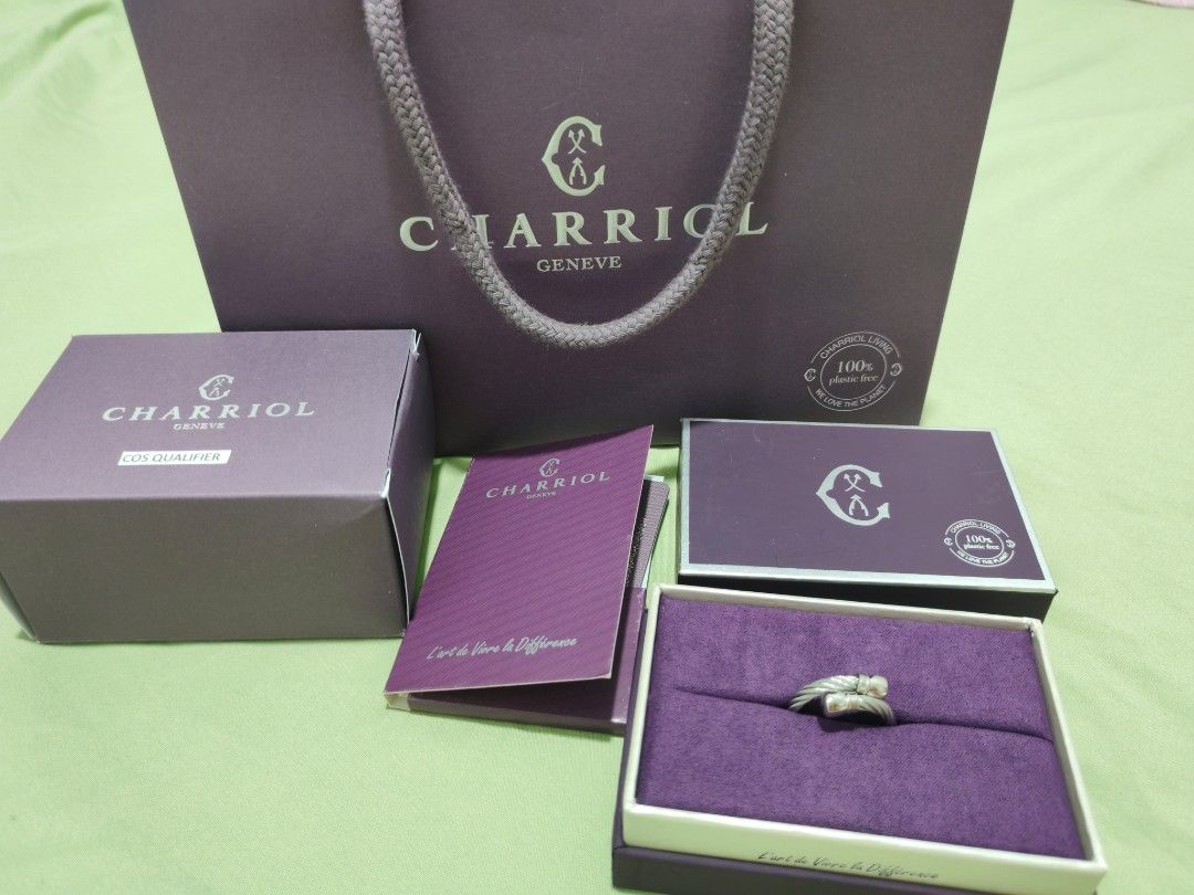 Charriol Geneva Ring with Original Packaging (Category: Rings) located in Quezon City. Submitted by carillepila (Listing ID 1466523859, Image 1). Description: - Authentic Charriol Geneva Ring - Elegant silver-tone finish with iconic twisted cable design and engraved ends - Complete full set: includes purple presentation box, outer box, and paperwork booklet - Bonus: matching Charriol paper gift bag included - Condition is pristine, ideal for gift
