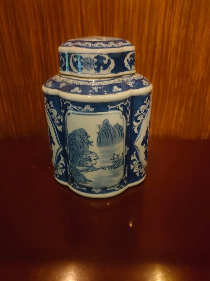 Chinese Blue and White Jar with Cover (Category: Vases & Decorative Bowls) located in Caloocan City. Submitted by rise-edge (Listing ID 1466399641, Image 2). Description: - Type: Chinese blue and white porcelain jar with matching cover - Design: Detailed hand-painted landscape and floral motif panels with bottom stamped mark - Dimensions: Approx. 7" (L) x 5.5" (W) x 9" (H) - Condition: Solid piece with traditional design - Perfect for: Home decor