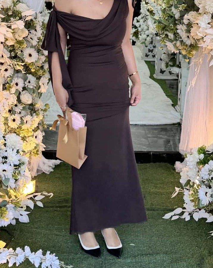 Choco brown long dress (Category: Evening dresses & gowns) located in Quezon City. Submitted by decluttermeee (Listing ID 1466366279, Image 2). Description: Used once on wedding .