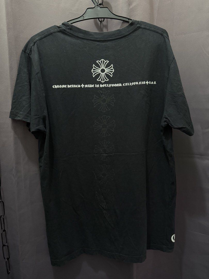Chrome Hearts (Category: Tshirts & Polo Shirts ) located in Manila. Submitted by craffee00 (Listing ID 1466363113, Image 3). Description: - Authentic Chrome Hearts T-Shirt - Size: Small - Color: Black - Features iconic horseshoe logo on chest pocket - Back graphic: Chrome Hearts logo with ‘Hollywood California U.S.A.’ text - Small logo detail on left sleeve hem - Made in USA.