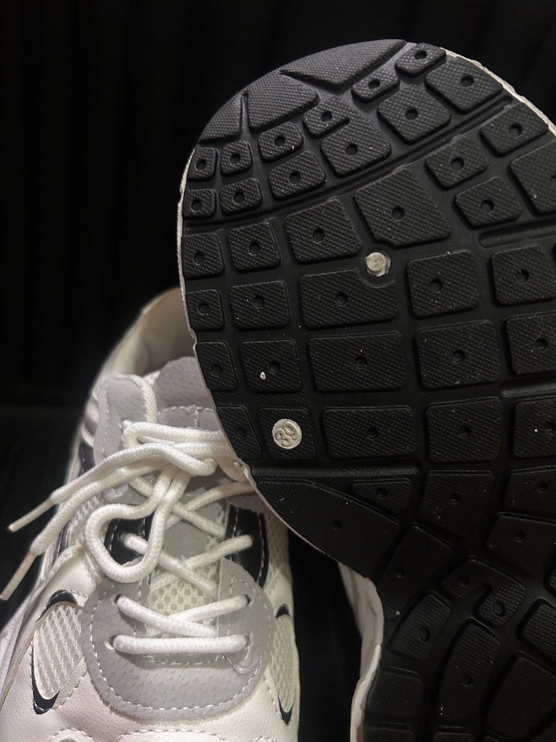 Chunky White and Grey Retro Sneakers (Category: Sneakers) located in Manila. Submitted by ericafelize23 (Listing ID 1466455265, Image 2). Description: - Style: Chunky white sneakers with grey and black accents - Materials: Mesh and leather-like upper panels with a thick black rubber outsole for great traction - Condition: Clean uppers and insoles - Inclusions: Comes with original white laces and shoe trees -No box included.
