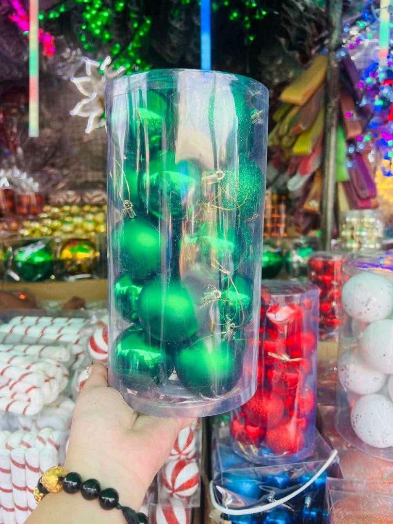 Clear cylindrical container filled with blue Christmas tree babbles (Category: Vases & Decorative Bowls) located in Manila. Submitted by princealmheracalista (Listing ID 1466485360, Image 2). Description: 📦 Bulk order available 🚚 Same-day delivery 📍 NCR / Manila 📩 PM me now!.