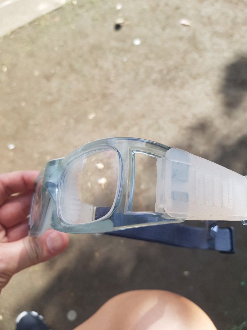 Clear sports goggles with blue elastic strap (Category: Sunglasses & Eyewear) located in Manila. Submitted by anthonylee23810 (Listing ID 1466450595, Image 2). Description: - Clear lenses installed for optimal vision during sports - Padded inner frame for extra comfort and impact absorption - Adjustable blue elastic strap for a secure, snug fit - Ideal for basketball, football, and other high-action sports.