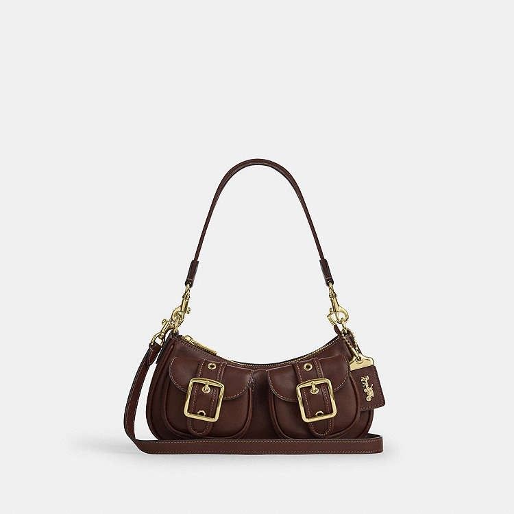 Coach Ashton Shoulder Bag in Maple (Category: Luxury Bags & Wallets) located in Las Pinas. Submitted by shopwithmira13 (Listing ID 1466563091, Image 2). Description: Measurements Length: 10.0" Height: 4.0" Width: 2.75" Materials Natural grain nappa leather Recycled polyester lining Handle Detachable handle with 8.75" drop Strap Detachable strap with 23.25" drop for shoulder or crossbody wear Features Outside magnetic snap pockets Inside multifunc