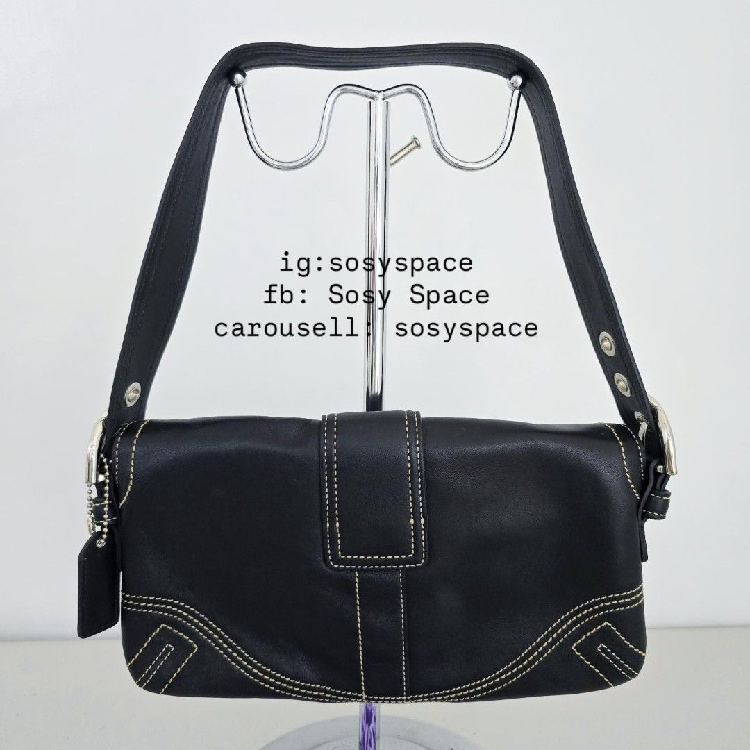 COACH Black Leather Shoulder Bag (Category: Shoulder Bags) located in Lucena. Submitted by sosyspace (Listing ID 1466412862, Image 3). Description: C. O. A. C. H. 07B1P239 Black Leather Soho Flab Buckle Shoulder Bag White Contrast Topstitching Sikver Toned Hardware 10.25x1.75x6 inches Condition: PRE-OWNED LIKE NEW NEVER USED signs of opening and closing, and being stored includes: Dust Bag vintage hard to find especially in this condition. Price: