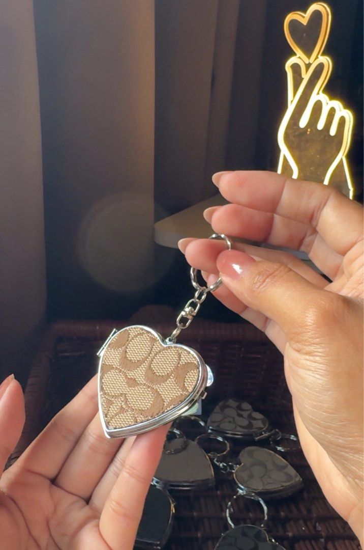 Coach Charm DIY (Category: Luxury Bags & Wallets) located in Lagawe. Submitted by favorsnflavors69115 (Listing ID 1466502586, Image 2). Description: DIY project Heart charm with mirror *used OG coach canvas ₱350+54 sf.
