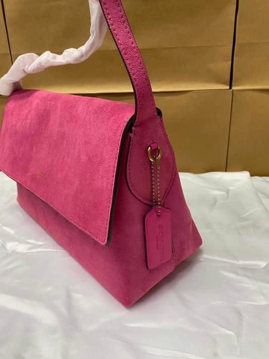 Coach Chelsea 🩷 (Category: Luxury Bags & Wallets) located in Las Pinas. Submitted by yhn_boutique (Listing ID 1466420264, Image 2). Description: Actual pic posted Lalamove ready Complete inclusion Dm .