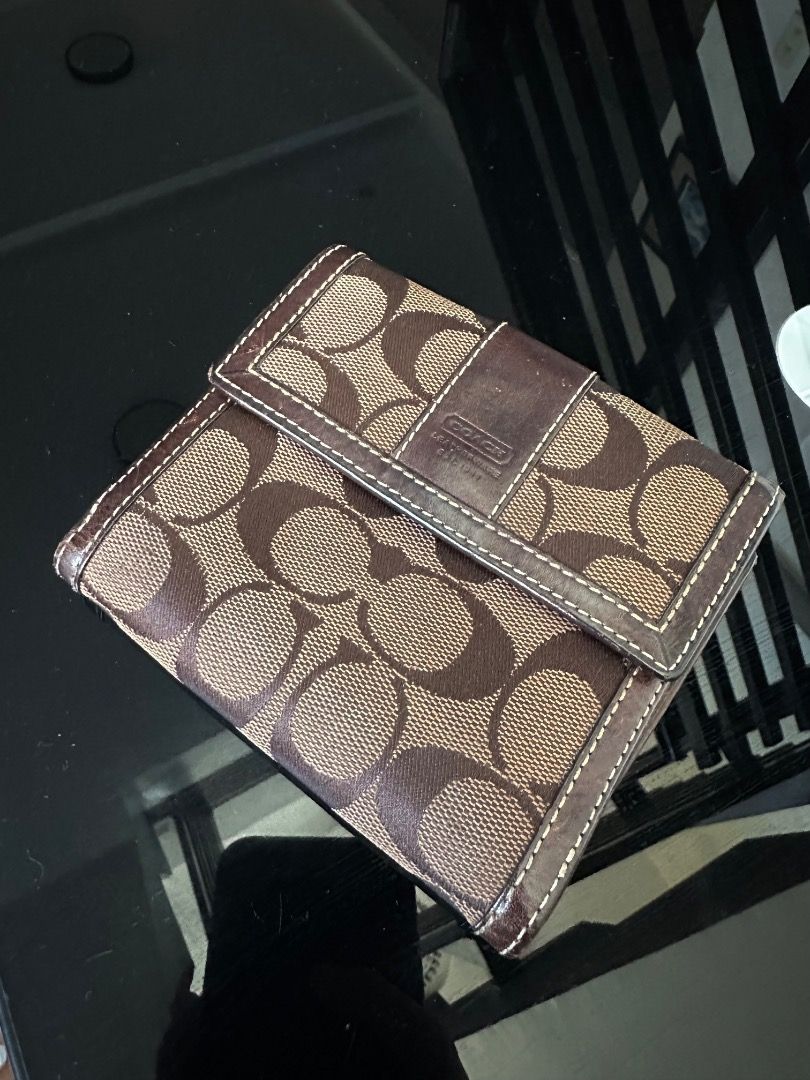 Coach Choco Brown Wallet (Category: Purses & Pouches) located in Dagupan City. Submitted by emmanreyes (Listing ID 1466360661, Image 1). Description: .