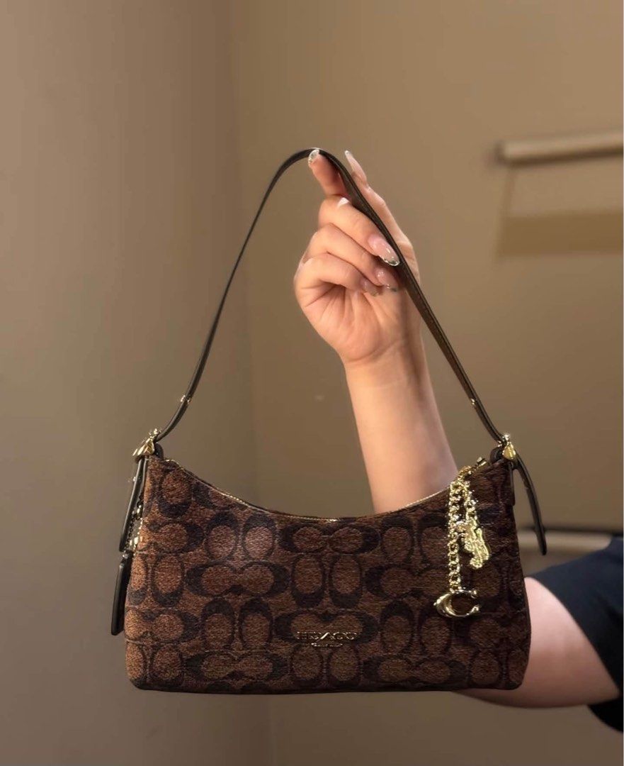 Coach emelia shoulder bag (Category: Luxury Bags & Wallets) located in Las Pinas. Submitted by yhn_boutique (Listing ID 1466419386, Image 1). Description: Actual pic posted Lalamove ready Complete inclusion Dm .