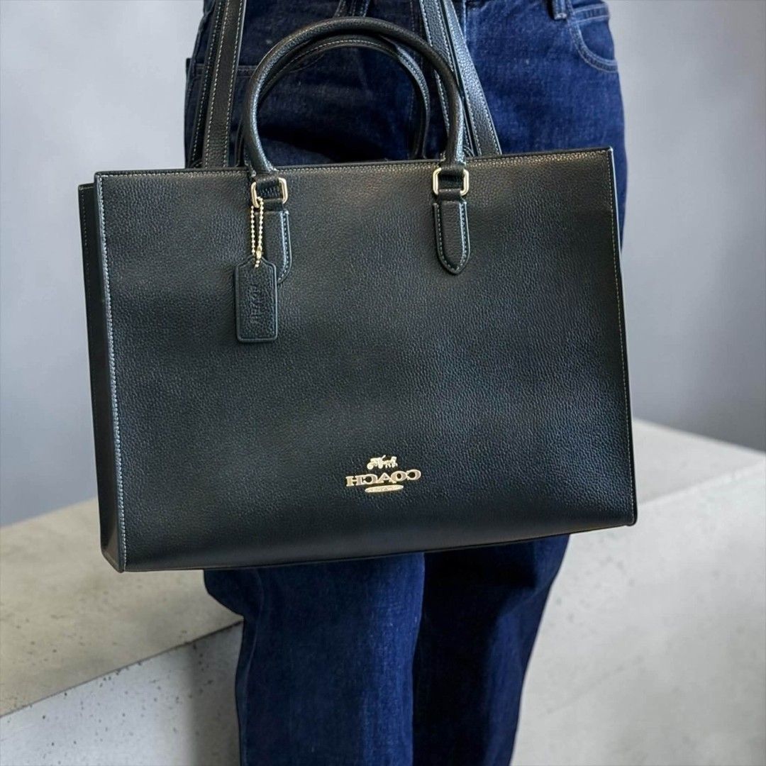 Coach Maggie Tote in Black (Category: Tote Bags) located in Quezon City. Submitted by bagsboutiqueph (Listing ID 1466493630, Image 3). Description: LAST PRICE POSTED. LIMITED STOCKS! BRANDNEW WITH INCLUSIONS. COLOR MAY SLIGHTLY VARY IN ACTUAL DUE TO LIGHTING AND CAMERA SETTING. OTHER PHOTOS WILL BE SEND DURING PURCHASE AND FOR SURE BUYERS ONLY. WHEN IN DOUBT, DO NOT ORDER. THANK YOU..
