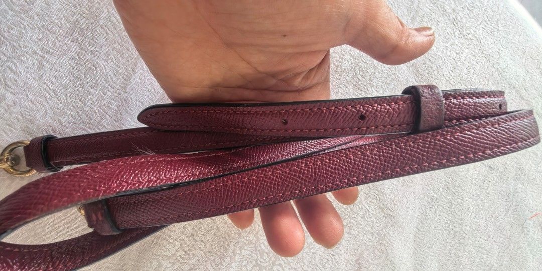 Coach maroon sling for bag (Category: Activewear) located in Tuguegarao City. Submitted by zenphoenix-7ad615 (Listing ID 1466563261, Image 1). Description: Faded hardware Red maroon color coach.