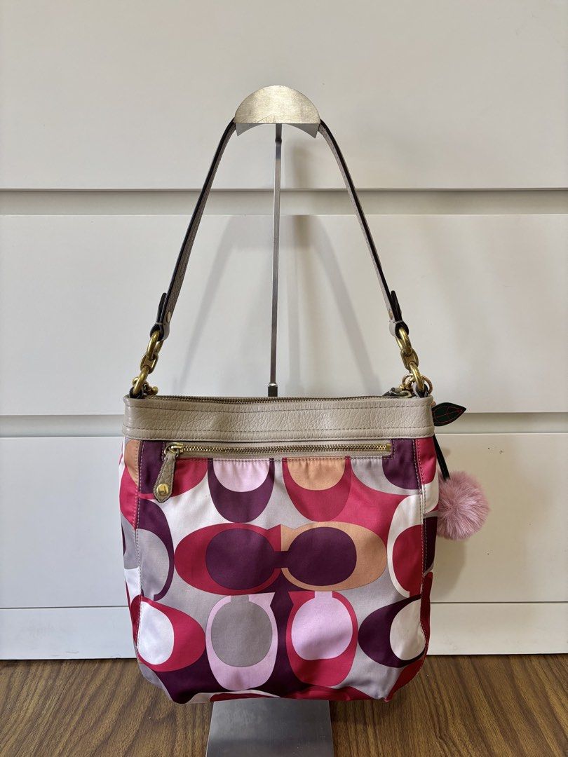 Coach Pink Scarf Print Two Way Bag (Category: Luxury Bags & Wallets) located in Manila. Submitted by vintage.maem (Listing ID 1466459903, Image 2). Description: Rank AB Condition 8.5/10 Dirt on canvas, signs of wear on leather parts and hardwares.