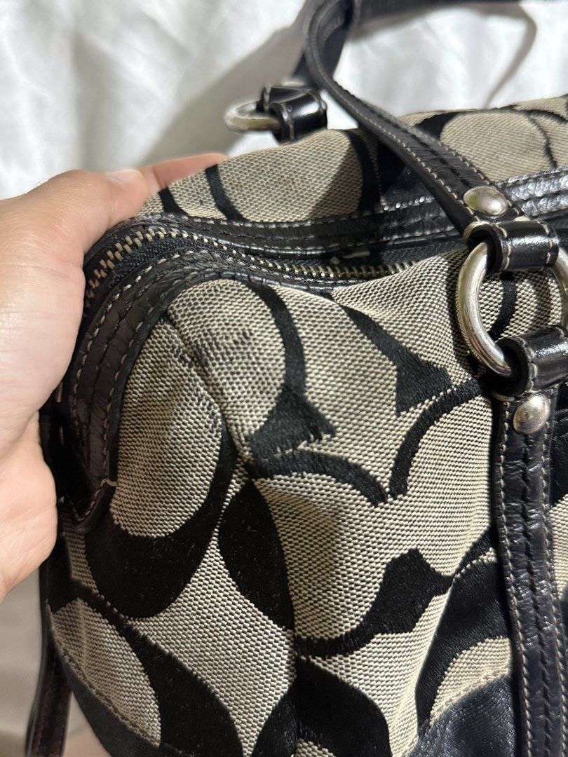Coach Signature stripe satchel Bag (Category: Luxury Bags & Wallets) located in Paranaque City. Submitted by calmpenguin_066c94 (Listing ID 1466490332, Image 3). Description: - Brand: Coach - Material: Signature C jacquard fabric with patent leather trim - Color: Black and beige - Hardware: Silver-tone - Closure: Zip-top - Interior: Clean lining with convenient slip pockets - Exterior: Protective metal feet on the bottom base - Condition: Pre-lov