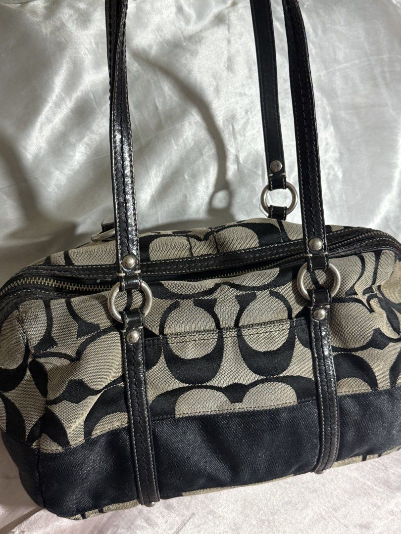 Coach Signature stripe satchel Bag (Category: Luxury Bags & Wallets) located in Paranaque City. Submitted by calmpenguin_066c94 (Listing ID 1466490332, Image 1). Description: - Brand: Coach - Material: Signature C jacquard fabric with patent leather trim - Color: Black and beige - Hardware: Silver-tone - Closure: Zip-top - Interior: Clean lining with convenient slip pockets - Exterior: Protective metal feet on the bottom base - Condition: Pre-lov
