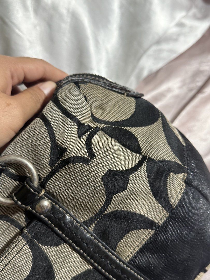 Coach Signature stripe satchel Bag (Category: Luxury Bags & Wallets) located in Paranaque City. Submitted by calmpenguin_066c94 (Listing ID 1466490332, Image 2). Description: - Brand: Coach - Material: Signature C jacquard fabric with patent leather trim - Color: Black and beige - Hardware: Silver-tone - Closure: Zip-top - Interior: Clean lining with convenient slip pockets - Exterior: Protective metal feet on the bottom base - Condition: Pre-lov