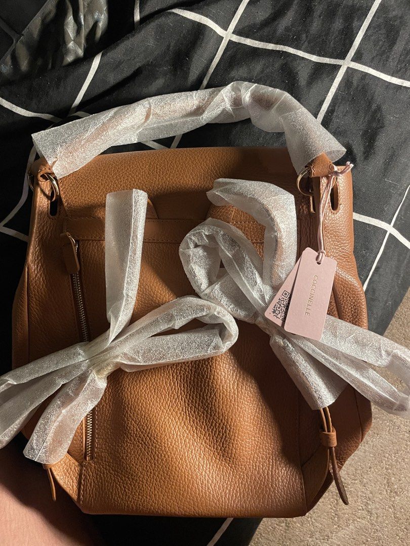 COCCINELLE original leather bag (Category: Luxury Bags & Wallets) located in Manila. Submitted by cupidlily (Listing ID 1466410599, Image 3). Description: coccinelle genuine leather backpack| unused, tags attached condition: brand new letting go of my coccinelle leather backpack bought this in Vienna, Austria for personal use, but honestly, I barely got to use it and it’s been sitting in storage ever since. sayang naman if a beautiful bag like th