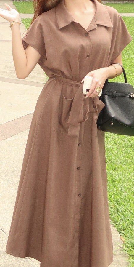 Collared Brown Maxi Dress (Category: Dresses) located in Paranaque City. Submitted by honeykkkk (Listing ID 1466463111, Image 2). Description: • Details: Shirt-style spread collar, short cap sleeves, front buttons, functional side pockets, and a matching tie belt for an adjustable silhouette. Neutral, versatile, and effortless for casual or smart-casual wear. • Condition: Excellent condition, worn once only in a passport application and college c