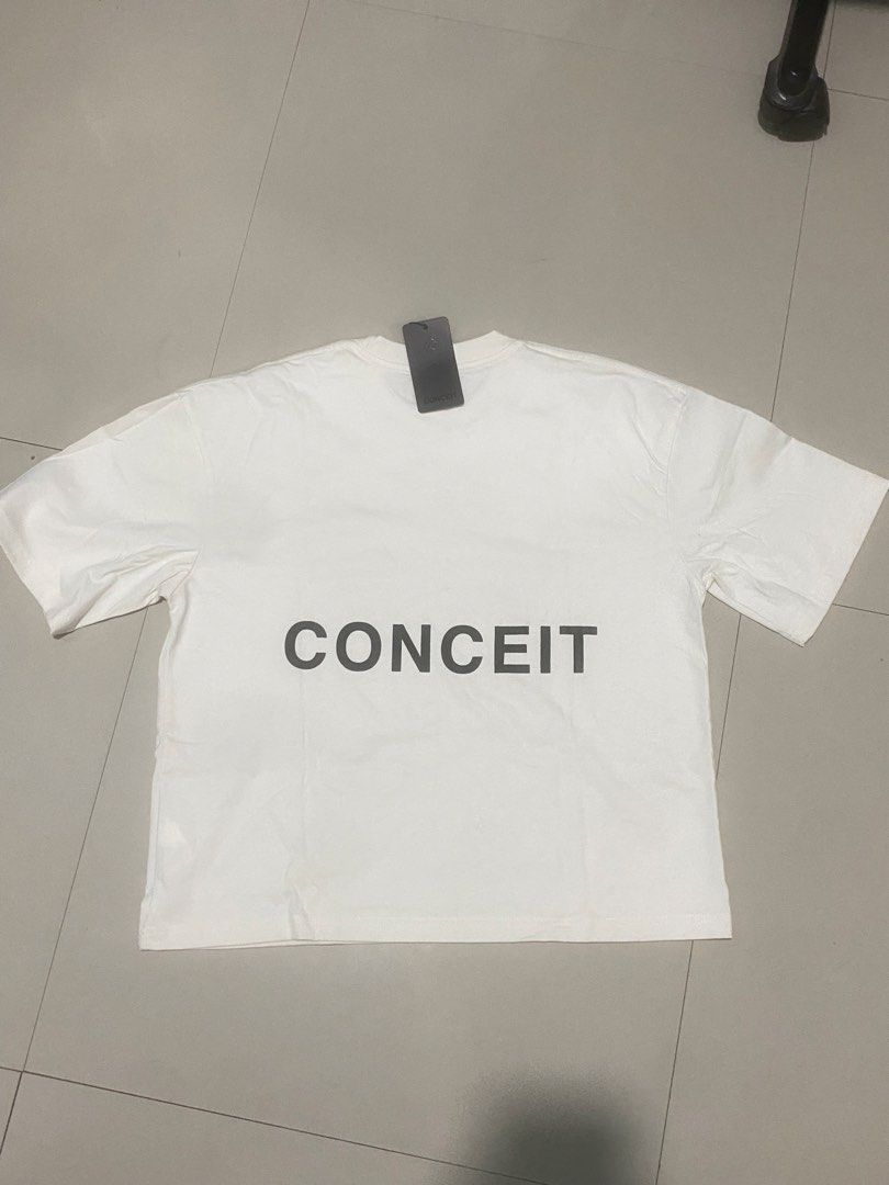 CONCEIT TOFU TEE (Category: Tshirts & Polo Shirts ) located in Quezon City. Submitted by mystic_dionson (Listing ID 1466353822, Image 1). Description: - L on tag - di pa nagagamit, naka stuck lang sa damitan - good condition 📌QC Loc.