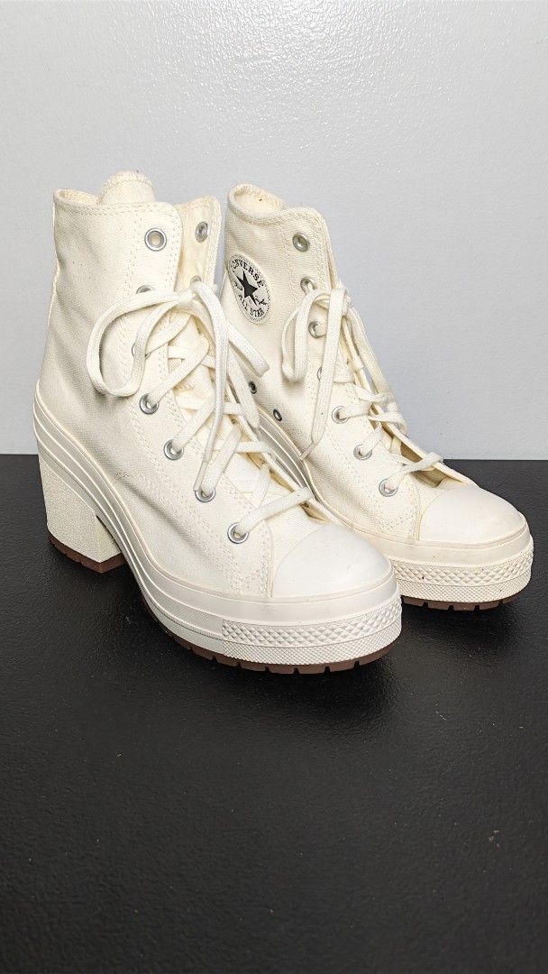 Converse Chuck 70 De Luxe Heel (Category: Sneakers) located in Manila. Submitted by chubbychic553 (Listing ID 1466509217, Image 2). Description: BRAND NEW UNUSED NO BOX Converse Chuck 70 De Luxe Heel - Color/Material: Off-white canvas - Design: Chunky block heel, rugged rubber outsole, classic star patch, and heel logo plate - Condition: Some minor dirt spots on the canvas upper and heel structurep Php 3000 loc Tayuman Manila .