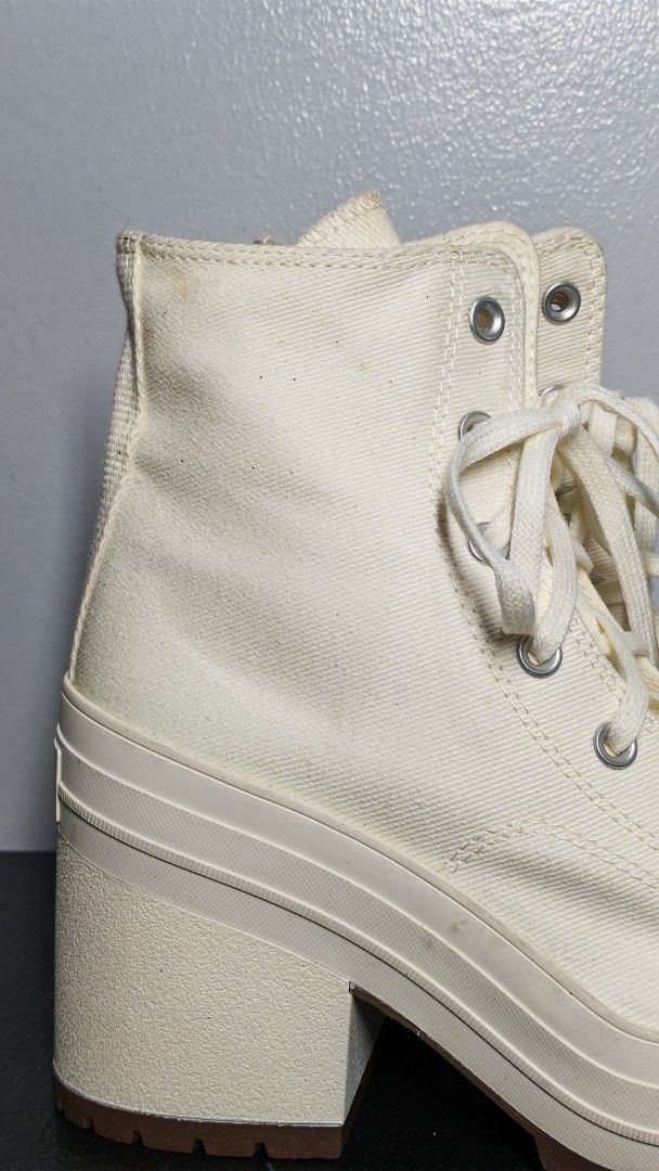 Converse Chuck 70 De Luxe Heel (Category: Sneakers) located in Manila. Submitted by chubbychic553 (Listing ID 1466509217, Image 3). Description: BRAND NEW UNUSED NO BOX Converse Chuck 70 De Luxe Heel - Color/Material: Off-white canvas - Design: Chunky block heel, rugged rubber outsole, classic star patch, and heel logo plate - Condition: Some minor dirt spots on the canvas upper and heel structurep Php 3000 loc Tayuman Manila .