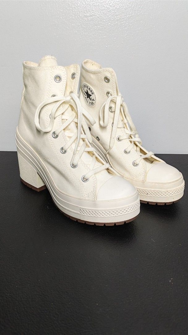 Converse Chuck 70 De Luxe Heel (Category: Sneakers) located in Manila. Submitted by chubbychic553 (Listing ID 1466509217, Image 1). Description: BRAND NEW UNUSED NO BOX Converse Chuck 70 De Luxe Heel - Color/Material: Off-white canvas - Design: Chunky block heel, rugged rubber outsole, classic star patch, and heel logo plate - Condition: Some minor dirt spots on the canvas upper and heel structurep Php 3000 loc Tayuman Manila .