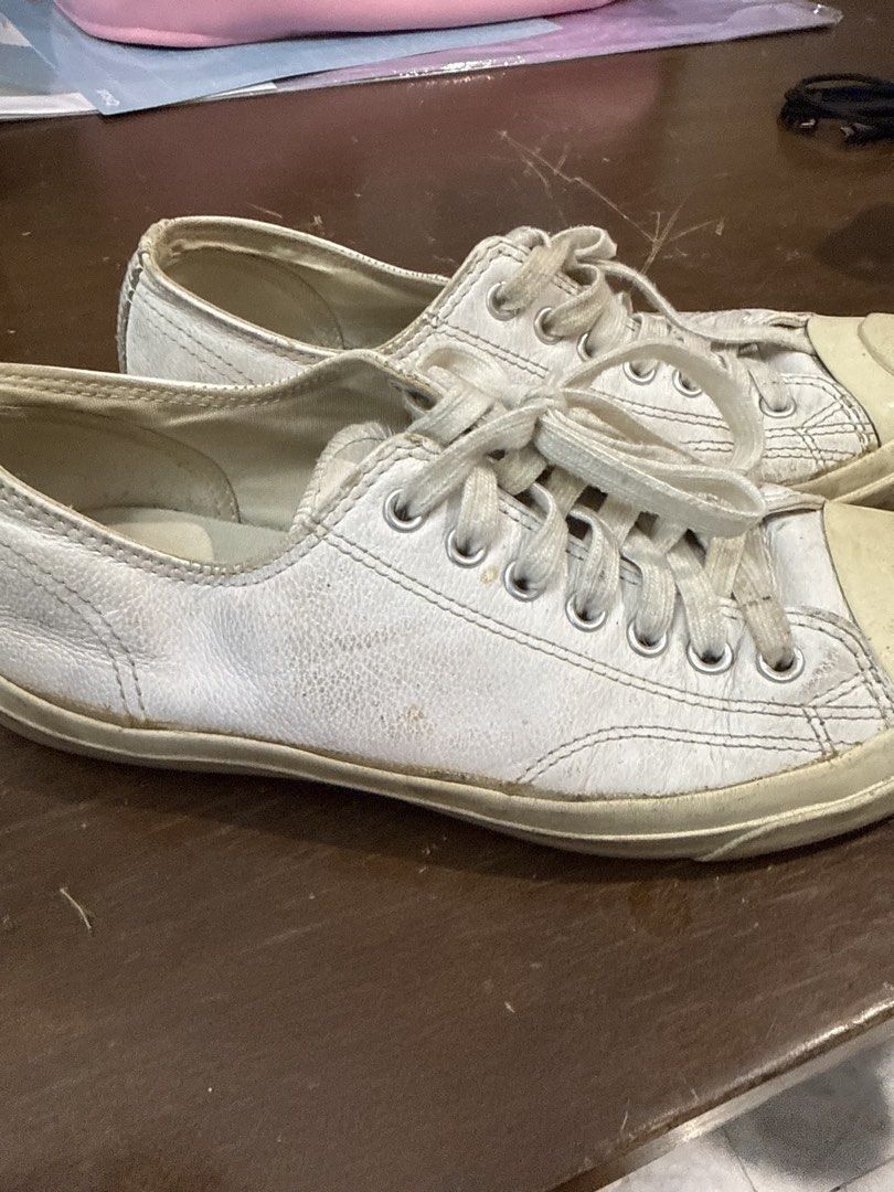Converse Jack Purcell Leather White Sneakers (Category: Sneakers) located in Quezon City. Submitted by nsseller (Listing ID 1466460731, Image 2). Description: - Brand: Converse Jack Purcell - Style: Low top sneakers, white leather - Size: Men's 7.5 / Women's 9 / UK 6.5 / EUR 40.5 / 25.5 cm - Features: Signature smile toe cap, classic lace-up closure, heel branding - Condition: Pre-owned with visible scuffs and signs of wear along the leather uppe