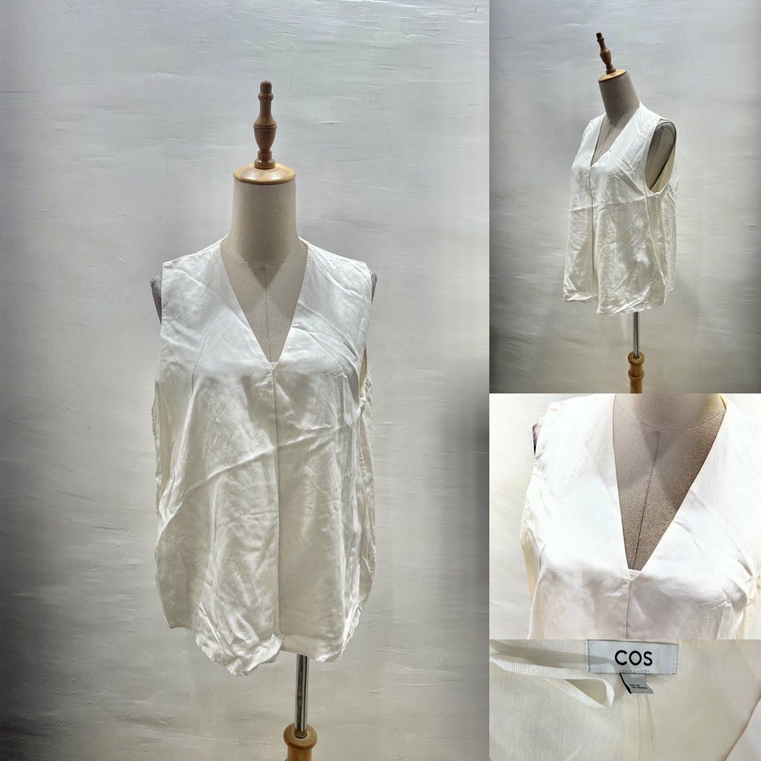 COS White V-Neck Sleeveless Top (Category: Sleeveless) located in Bacolod City. Submitted by bhabissagal-05763 (Listing ID 1466499067, Image 1). Description: - Brand: COS - Color: White - Size: EUR 36 - Design: Deep V-neckline with a clean, minimalist aesthetic - Fit: Relaxed and sleeveless - Fabric: Lightweight and breathable, great for layering or warm weather.