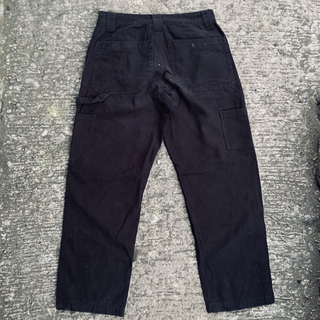CossRetro Black doblue knee Carpenter Pants Utility Trousers (Category: Jeans) located in Tabaco. Submitted by bayhust (Listing ID 1466430863, Image 2). Description: 29-30x36.5x8 EXCELLENT 9.8/10 color rate minimal scratch - Brand: CossRetro - Color: Classic black (zero fading) - Material: Heavy-duty canvas build with metal rivets - Features: Multiple utility pockets, reinforced knee panels, and built-in hammer loop - Closure: Button fly - Style: