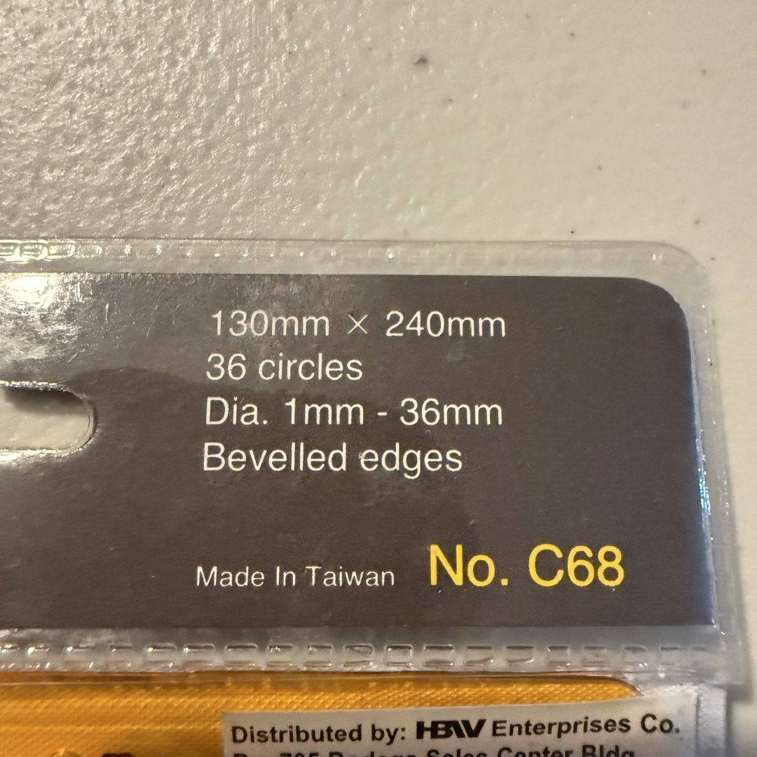 Cox Circle Template No. C68 (Category: Craft Supplies & Tools) located in Manila. Submitted by cheemkenn (Listing ID 1466413679, Image 3). Description: - Brand: Cox - Model: C68 Circle Template Tool - Condition: Brand new, still sealed in original packaging - Dimensions: 130mm x 240mm - Features: 36 circles with diameters from 1mm to 36mm - Design: Beveled edges for precise drawing made of clear yellow plastic.