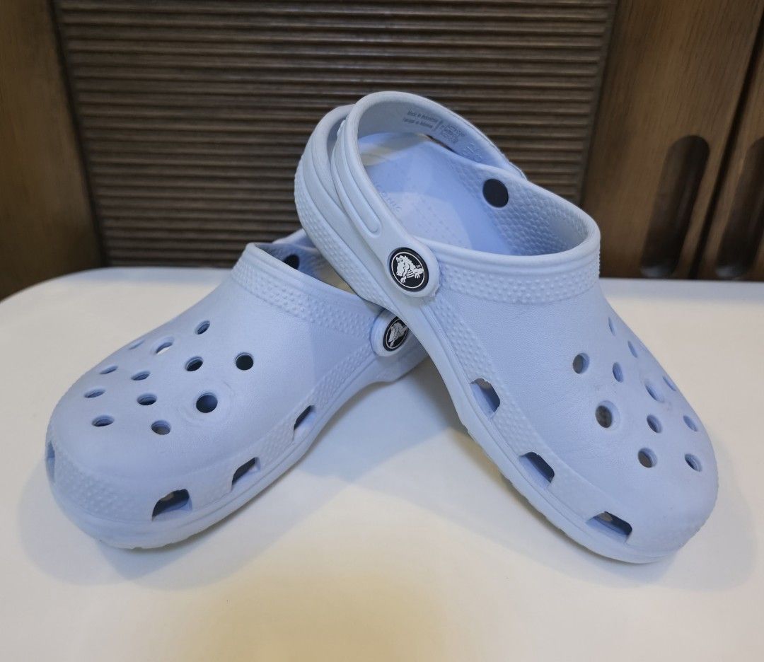 Crocs Classic Clogs Light Blue Size C12 (Category: Slippers and slides) located in San Fernando. Submitted by iris_dj23 (Listing ID 1466360044, Image 2). Description: - Color: Light blue - Style: Classic Crocs clogs for kids - Size: C12 (stamped on sole).
