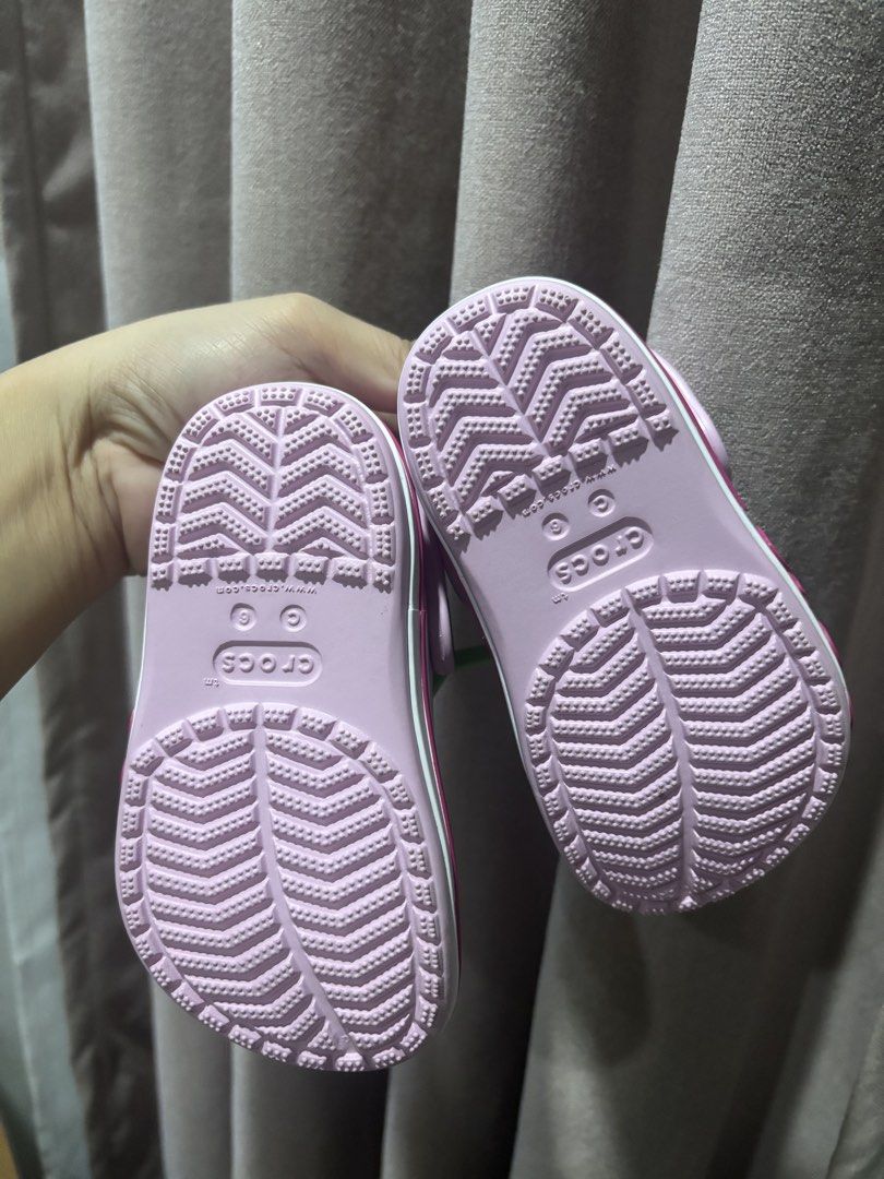 Crocs Clog Toddler Size C6 Pink (Category: Babies & Kids Fashion) located in San Mateo. Submitted by f8e3sj (Listing ID 1466489246, Image 2). Description: - Brand new, never worn - Pink Crocs Baya Band Clog for toddlers - Size: C6 (EUR 22-23, 130mm) - Lightweight slip-on design - Comes in original plastic packaging with hanger attached.