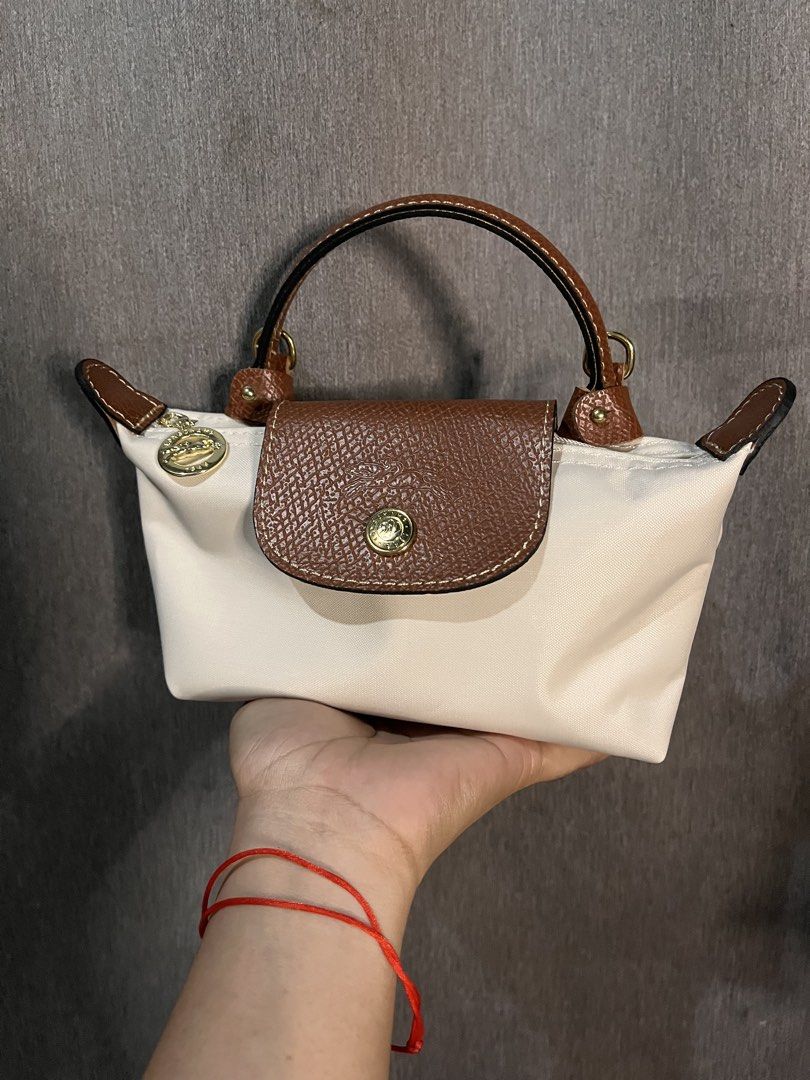Crossbody micro mini Longchamp paper white (Category: Cross-body Bags) located in San Jacinto. Submitted by kellysthrift_ (Listing ID 1466457636, Image 1). Description: Longchamp paper white .