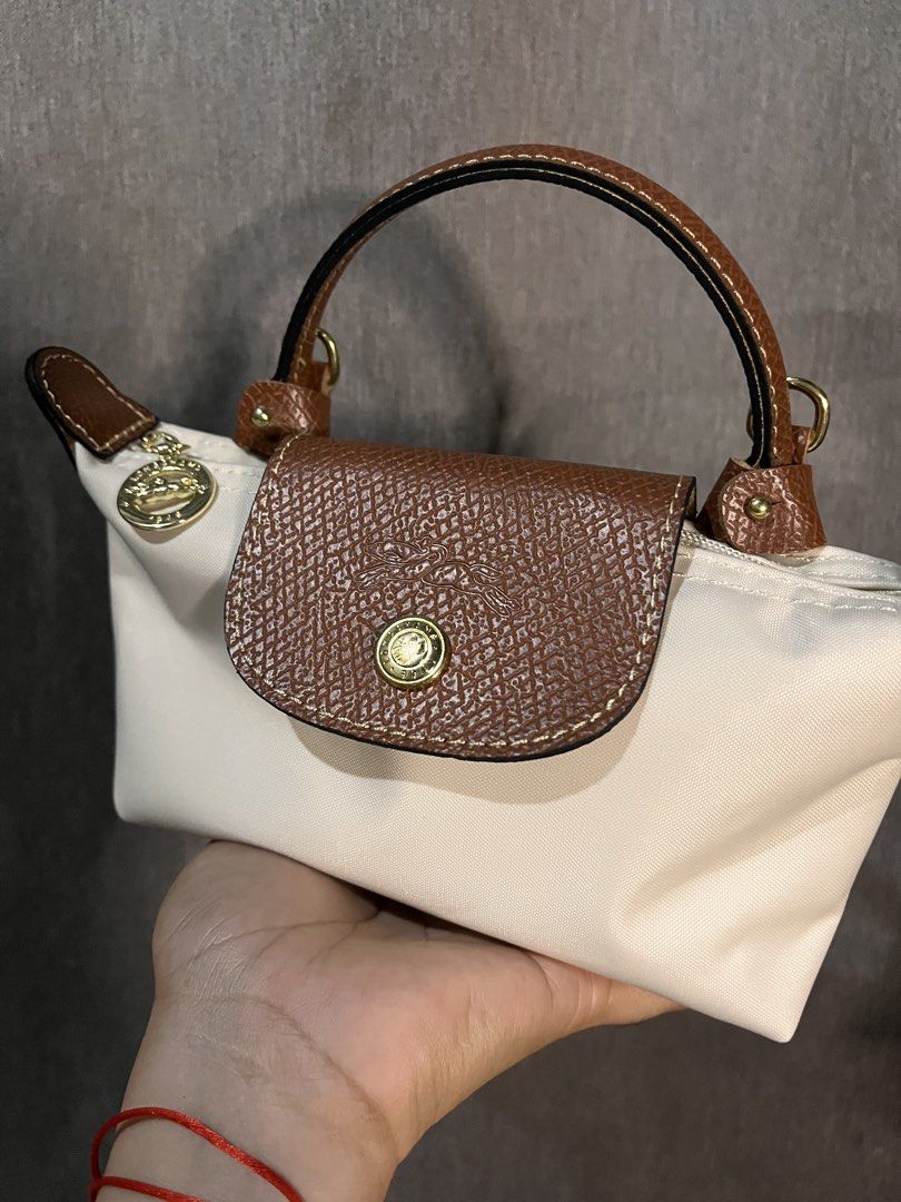 Crossbody micro mini Longchamp paper white (Category: Cross-body Bags) located in San Jacinto. Submitted by kellysthrift_ (Listing ID 1466457636, Image 2). Description: Longchamp paper white .