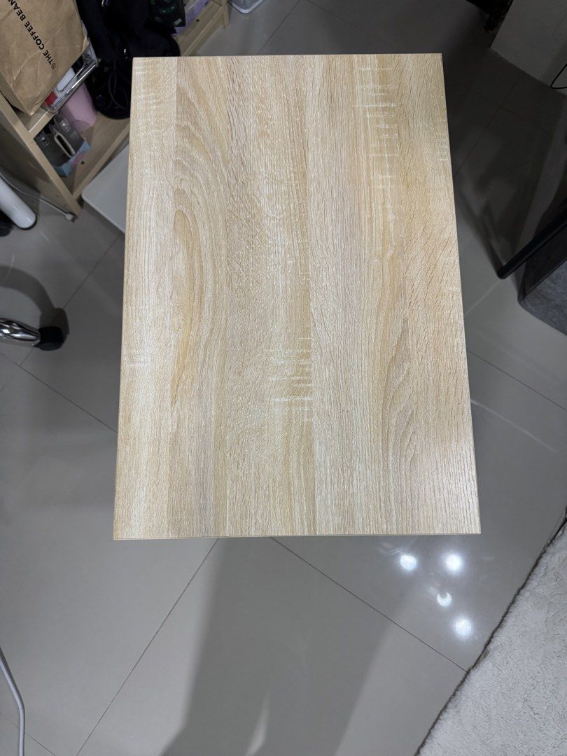 side table (Category: Tables & Sets) located in Cagayan de Oro. Submitted by serenexsienna (Listing ID 1466458109, Image 3). Description: ✅C-shaped side table with wood top and metal frame ✅Beside your sofa or bed ✅Stylish light wood grain top with a sturdy black metal base ✅Clean and minimal look, perfect for small spaces ✅Ideal for display, working on your laptop or enjoying snacks.