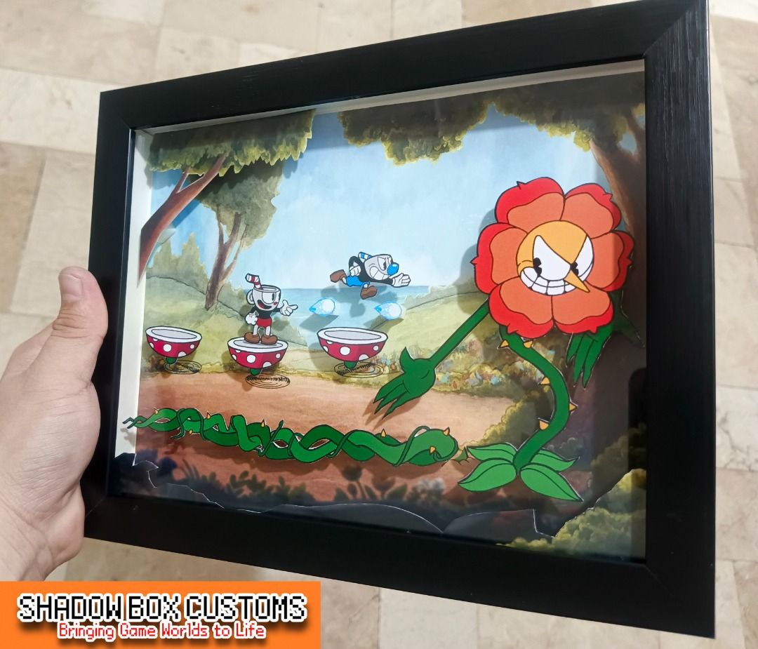 Cuphead Vs Cagney Carnation Video Game Shadow Box (Category: Nintendo) located in Quezon City. Submitted by natzuki10 (Listing ID 1466362670, Image 3). Description: Cuphead Vs Cagney Carnation Video Game Shadow Box Height: 8 inches Width: 10 inches 750 w/o lights 920 w/ lights *Handmade Pixel Shadow Boxes *Accepting Customized Designs *Perfect for Gamers & Collectors #videogames #nintendo #playstation #roomdecor #collection #gamer #gift.