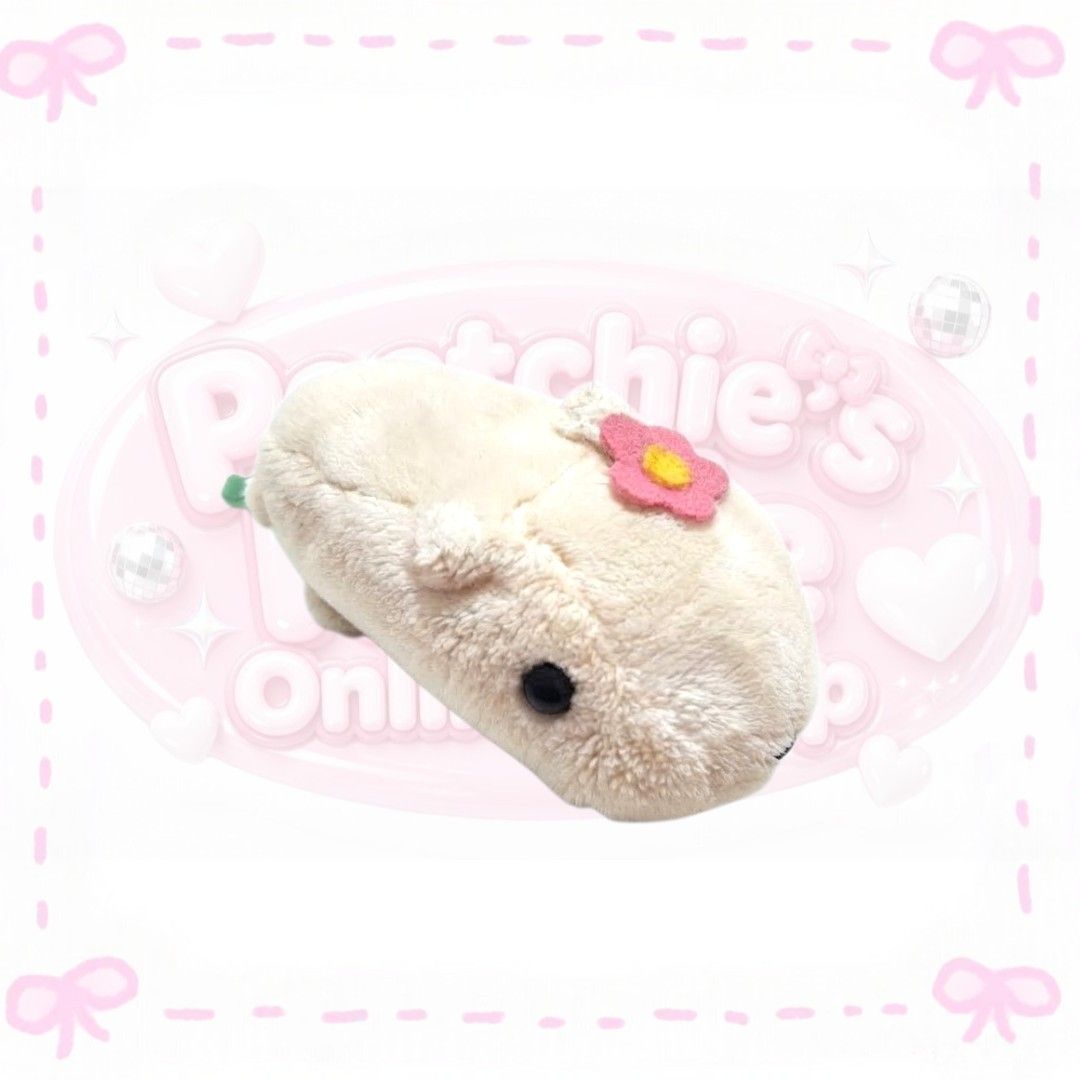 Cute Capybara Plush Toy with Flower Accent (Category: Plushies & Soft Toys) located in Sorsogon. Submitted by mitchelle0425 (Listing ID 1466514704, Image 1). Description: - Super soft and fluffy light cream fur - Adorned with a cute pink felt flower with a yellow center - Features small stubby ears and sweet dark bead eyes - Perfect as a cute room decor piece or a great addition to your plushie collection.