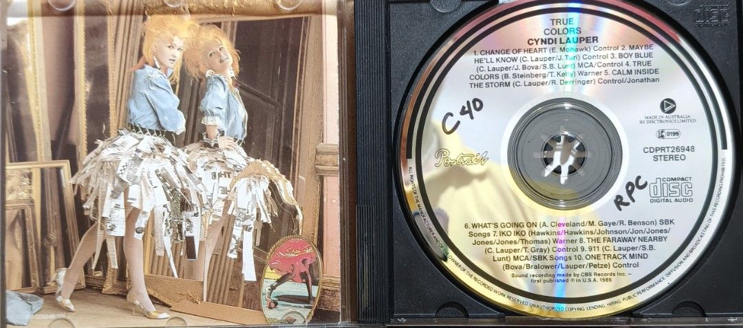 Cyndi Lauper True Colors Audio CD (Category: CDs & DVDs) located in Manila. Submitted by ruelcabrer77078 (Listing ID 1466429869, Image 3). Description: - Artist & Album: Cyndi Lauper - True Colors (CD) - Key Tracks: True Colors, Change of Heart, and Boy Blue - Condition: Case shows handling/age wear, jewel case remains intact - Disc Note: Has handwritten marks on the label side - Perfect for: 80s pop music lovers and retro collectors.