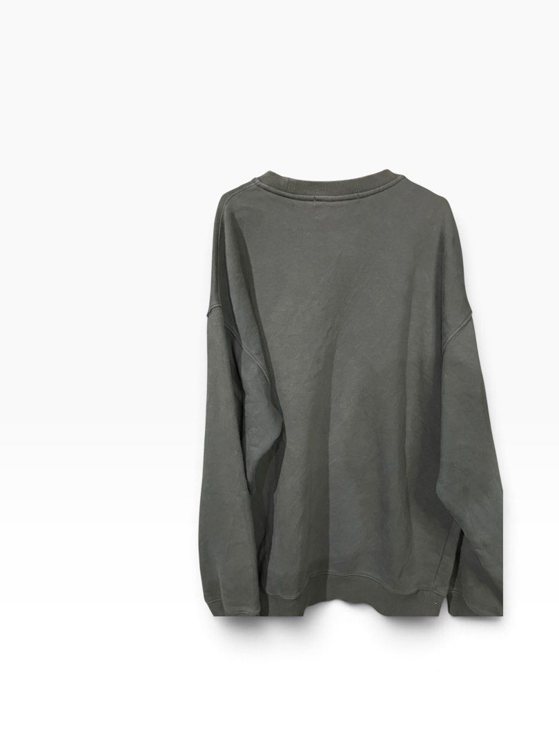 Dark Grey Graphic Sweatshirt Playing An Instrument (Category: Coats, Jackets and Outerwear) located in Manila. Submitted by matik6 (Listing ID 1466542304, Image 2). Description: Dark grey crewneck sweatshirt with oversized fit. Graphic print on the chest reads PLAYING AN INSTRUMENT with a character drinking. Ribbed collar, cuffs, and hem. Clean back with no prints. Super comfy casual wear for everyday hanging out..