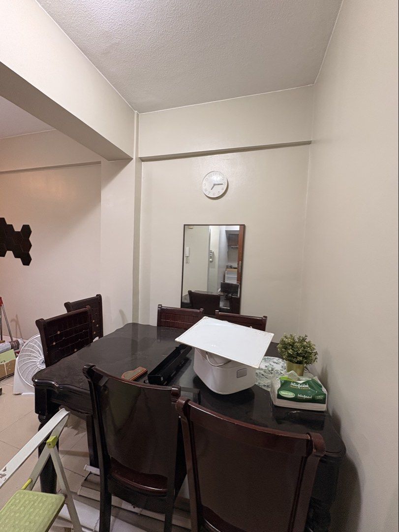 Dark Wood Dining Table with Matching Chairs (Category: Tables & Sets) located in Paranaque City. Submitted by aihp20 (Listing ID 1466508143, Image 1). Description: - Set includes: 1 solid dark wood dining table and 6 matching high-backed chairs - Build: Sturdy, substantial size, and structurally solid - Condition: Minor surface wear from everyday use, but well-maintained - Style: Classic finish that fits traditional or modern dining spaces - Deli