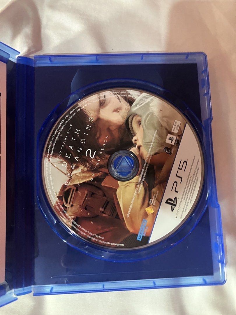 Death Stranding 2 On The Beach PS5 (Category: PlayStation) located in Pasig City. Submitted by kinderdrpt (Listing ID 1466441642, Image 2). Description: - Title: Death Stranding 2 On The Beach - Platform: PlayStation 5 (PS5) - Condition: Like new, original case and disc included - Disc: 100% clean, zero scratches - Reason for selling: Finished the game, clearing shelf space.
