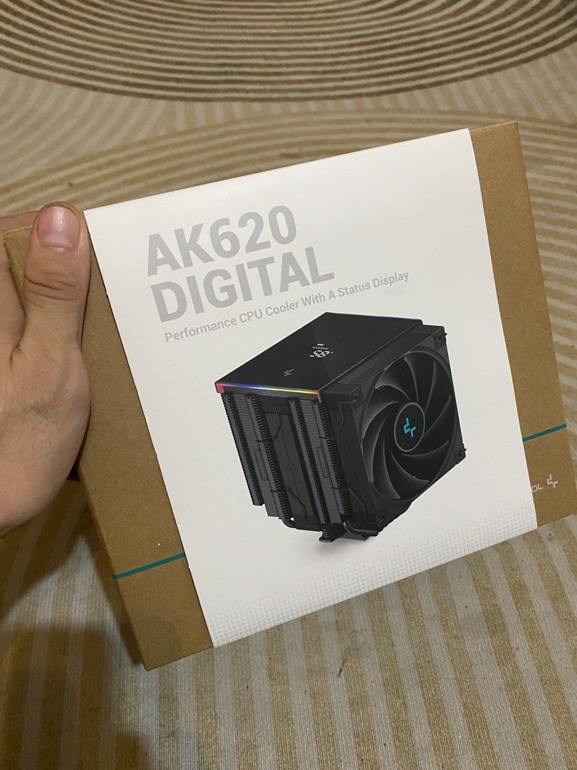 DeepCool AK620 Digital 1 month used (Category: Computer Parts) located in Cebu City. Submitted by therewronill (Listing ID 1466563616, Image 1). Description: - Model: DeepCool AK620 Digital (R-AK620-BKADMN-G) - Design: Black dual-tower heatsink layout with dual fans - Features: Built-in real-time status display - Compatibility: Supports multiple Intel and AMD sockets - Inclusions: Complete with original packaging, mounting hardware, and all acces