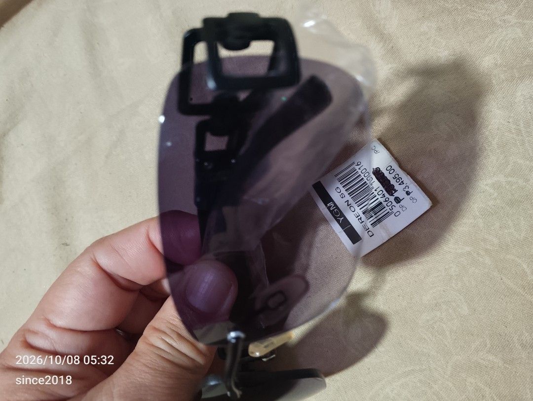 Dereon Eyewear APH553 001 Sunglasses (Category: Sunglasses & Eyewear) located in Quezon City. Submitted by sellingwithlove2018 (Listing ID 1466561397, Image 2). Description: - Brand: Dereon SG - Model: APH553 001 - Color/Style: Black frame with stylish purple gradient tinted lenses - Design: Rimless lower frame with geometric cutout detailing on the temple arms - Condition: Brand new, never worn, straight out of the store(ideal vision) - Inclusio