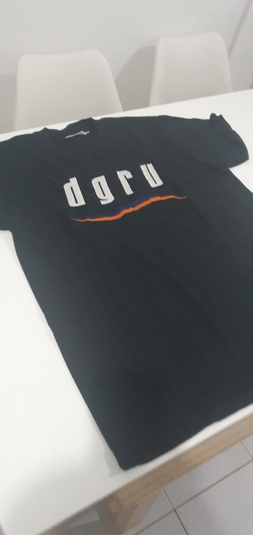 DGRV Black Graphic T-Shirt Size L (Category: Tshirts & Polo Shirts ) located in Quezon City. Submitted by sk8ter13 (Listing ID 1466443592, Image 2). Description: - Brand: DGRV - Size: Large - Color: Black - Design: Bold white chest lettering with blue and orange wavy graphic - Material: Soft, comfortable cotton - Fit: Standard crew neck with short sleeves - Condition: Clean fabric, well-maintained.